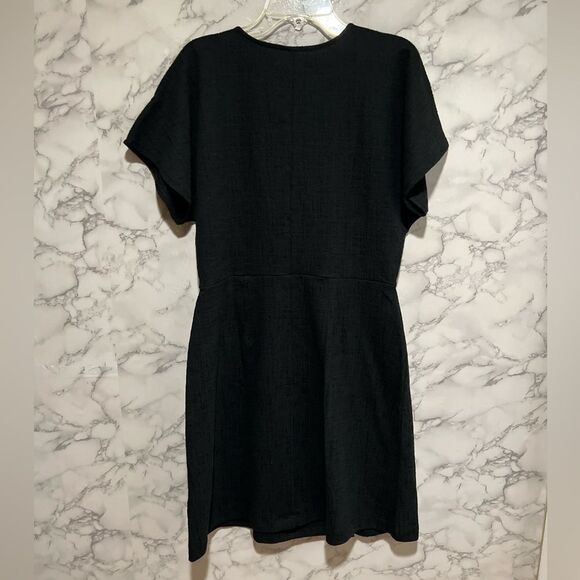 MADEWELL BLACK CROSS-FRONT FLUTTER-SLEEVE FIT & FLARE MINI DRESS - Picture 6 of 7